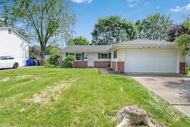 4861 Warminster Dr, Columbus, OH 43232 - single story home featuring brick siding, an attached garage, concrete driveway, and a front yard