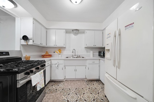 4861 Warminster Dr, Columbus, OH 43232 - kitchen with appliances with stainless steel finishes, a sink, light countertops, white cabinets, and light tile patterned floors