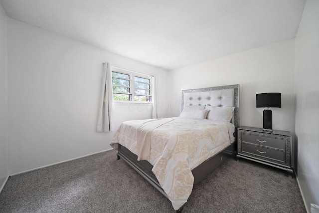 4861 Warminster Dr, Columbus, OH 43232 - bedroom featuring dark carpet and baseboards