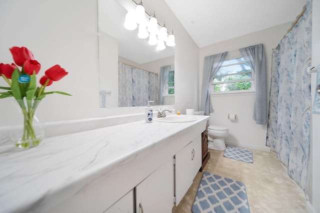 4861 Warminster Dr, Columbus, OH 43232 - bathroom featuring vanity, toilet, a shower with shower curtain, vaulted ceiling, and baseboards