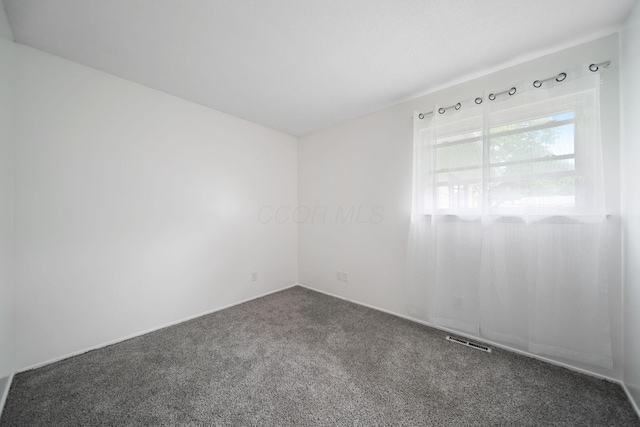 4861 Warminster Dr, Columbus, OH 43232 - carpeted empty room featuring baseboards