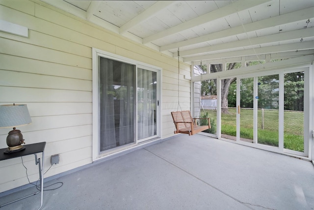 4861 Warminster Dr, Columbus, OH 43232 - unfurnished sunroom with beam ceiling