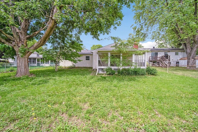 4861 Warminster Dr, Columbus, OH 43232 - view of yard featuring a sunroom