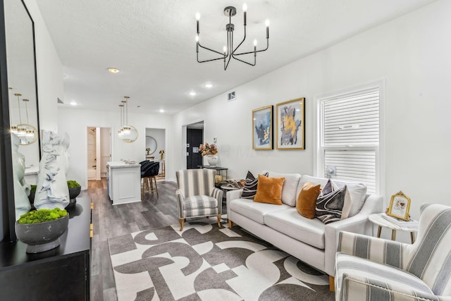 568 Wilson Ave, Marion, OH 43302 - living area featuring a chandelier, dark wood finished floors, and recessed lighting