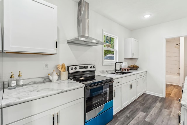 568 Wilson Ave, Marion, OH 43302 - kitchen featuring electric stove, wall chimney range hood, a sink, white cabinetry, and dark wood finished floors