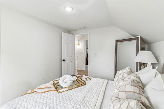 568 Wilson Ave, Marion, OH 43302 - carpeted bedroom with lofted ceiling