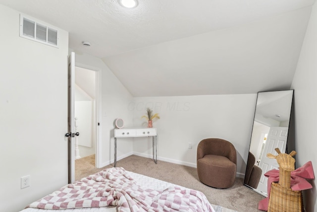 568 Wilson Ave, Marion, OH 43302 - carpeted bedroom with lofted ceiling and baseboards