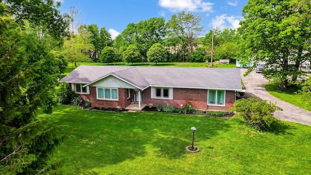 13742 State Rte 41, Jeffersonville, OH 43128 - ranch-style house with brick siding and a front yard