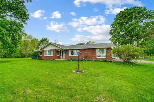 13742 State Rte 41, Jeffersonville, OH 43128 - ranch-style home with a front yard and brick siding