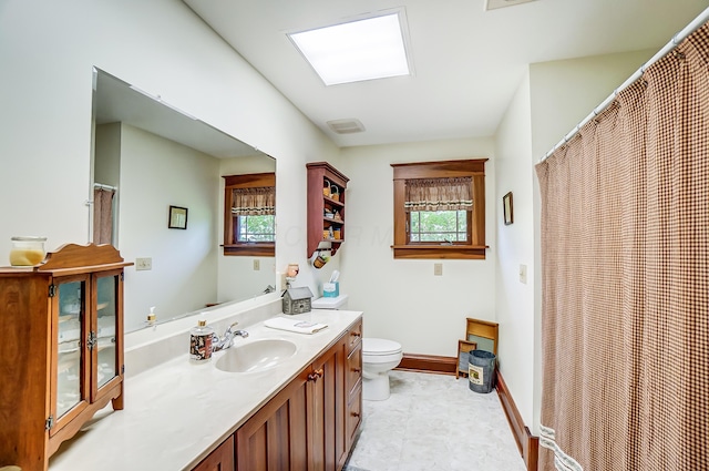 13742 State Rte 41, Jeffersonville, OH 43128 - full bath featuring toilet, vanity, and baseboards