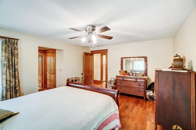 13742 State Rte 41, Jeffersonville, OH 43128 - bedroom with wood finished floors and a ceiling fan