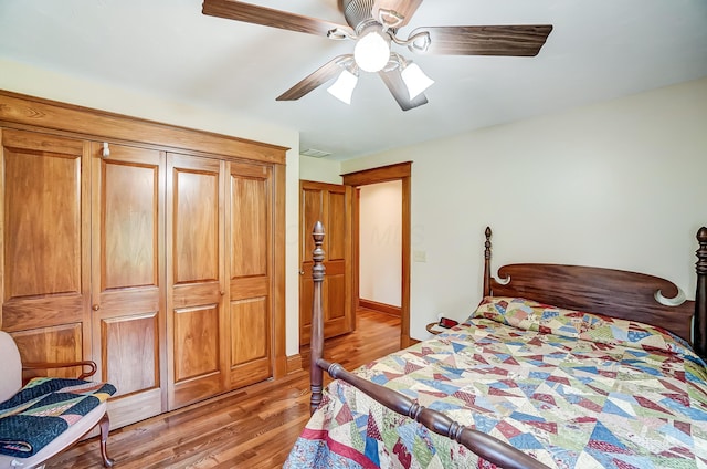 13742 State Rte 41, Jeffersonville, OH 43128 - bedroom featuring light wood finished floors, ceiling fan, and a closet