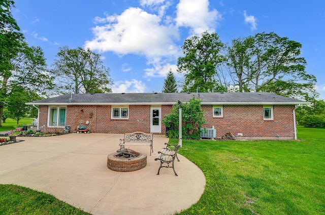 13742 State Rte 41, Jeffersonville, OH 43128 - rear view of house with a fire pit, a patio area, cooling unit, and brick siding