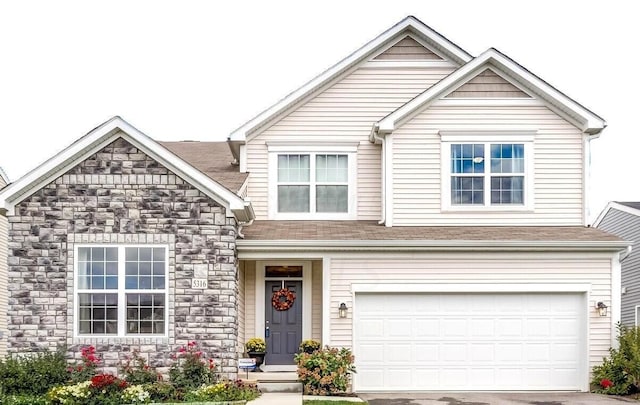 5316 Wabash River St, Dublin, OH 43016 - traditional-style house with stone siding, concrete driveway, an attached garage, and a shingled roof