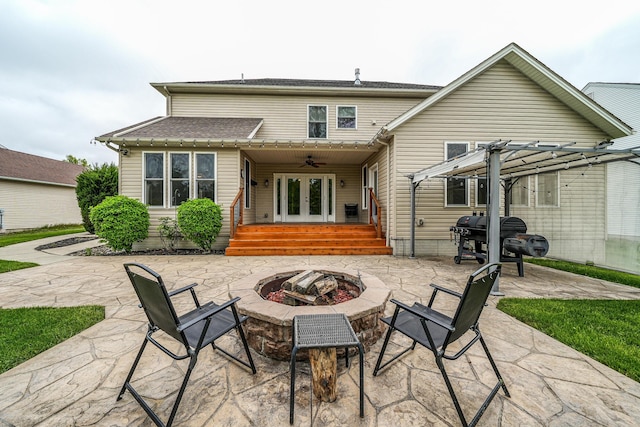 21252 Breckenridge Ln, Strongsville, OH 44149 - rear view of house with an outdoor fire pit, french doors, a patio, ceiling fan, and a pergola