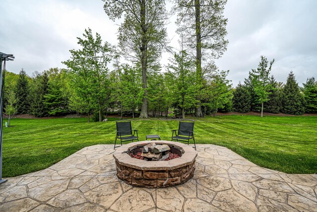 21252 Breckenridge Ln, Strongsville, OH 44149 - view of patio / terrace featuring an outdoor fire pit