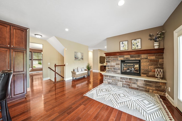 21252 Breckenridge Ln, Strongsville, OH 44149 - living area with dark wood finished floors, baseboards, recessed lighting, and a fireplace