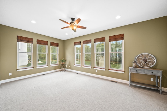 21252 Breckenridge Ln, Strongsville, OH 44149 - spare room featuring ceiling fan, carpet flooring, baseboards, plenty of natural light, and recessed lighting
