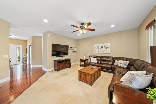 21252 Breckenridge Ln, Strongsville, OH 44149 - living room with a ceiling fan, recessed lighting, light wood-style floors, baseboards, and light carpet