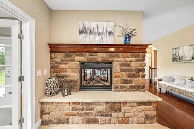 21252 Breckenridge Ln, Strongsville, OH 44149 - detailed view of a stone fireplace and wood finished floors