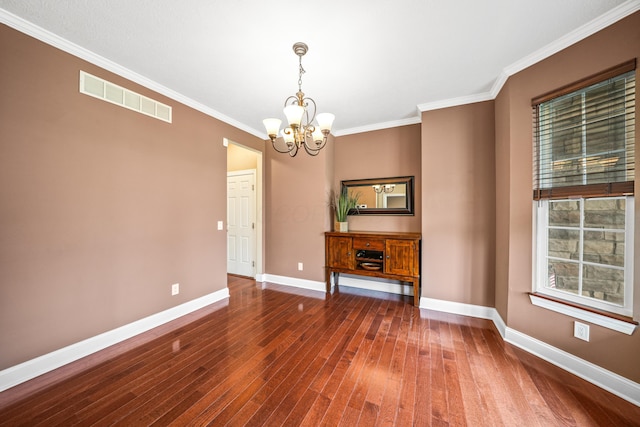 21252 Breckenridge Ln, Strongsville, OH 44149 - unfurnished dining area featuring a chandelier, hardwood / wood-style floors, baseboards, and ornamental molding