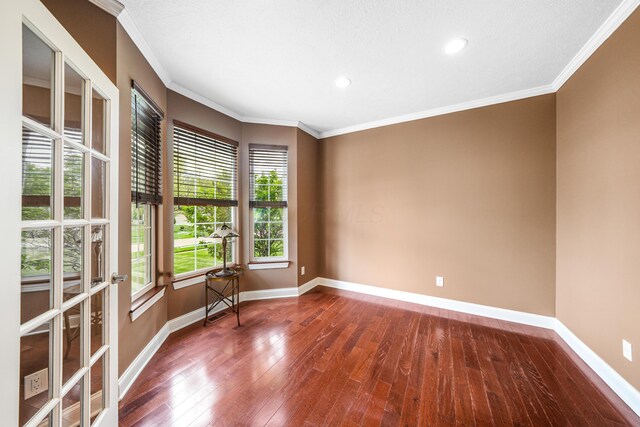 21252 Breckenridge Ln, Strongsville, OH 44149 - spare room featuring baseboards, wood-type flooring, crown molding, and recessed lighting