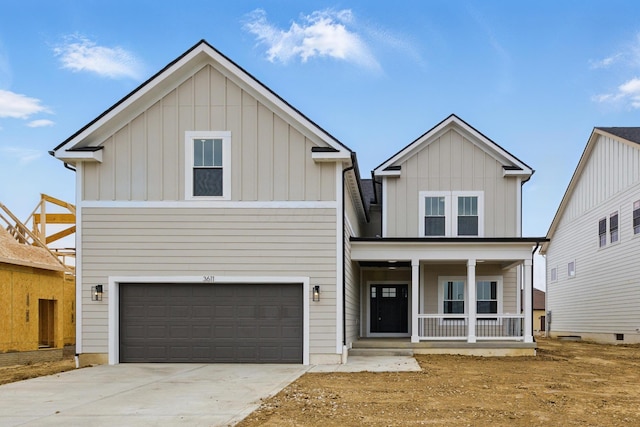 view of front of home featuring board and batten siding, a porch, an attached garage, and driveway