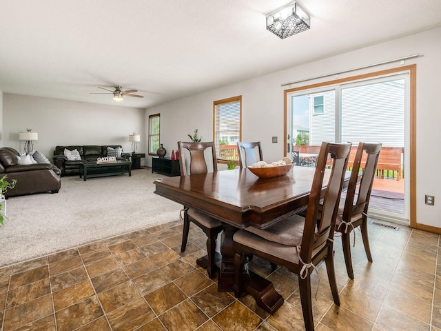 5292 Winters Run Rd, Dublin, OH 43016 - dining room featuring ceiling fan and dark carpet