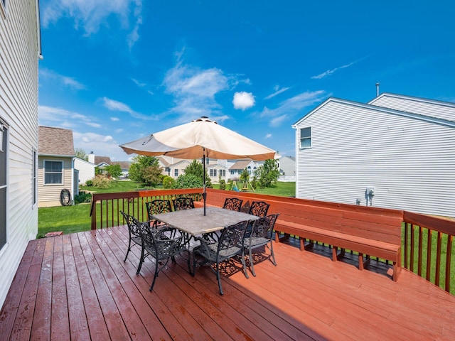 5292 Winters Run Rd, Dublin, OH 43016 - wooden terrace with outdoor dining area, a lawn, and a residential view