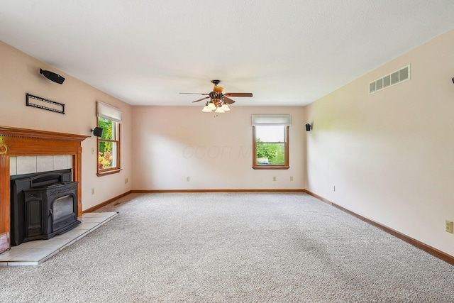 4217 Caswell Rd, Johnstown, OH 43031 - unfurnished living room featuring light carpet, ceiling fan, and baseboards