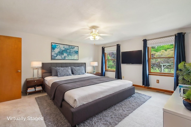 4217 Caswell Rd, Johnstown, OH 43031 - bedroom featuring light carpet and a ceiling fan