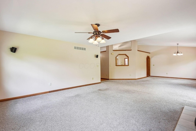 4217 Caswell Rd, Johnstown, OH 43031 - unfurnished living room with light carpet, a ceiling fan, a chandelier, and baseboards