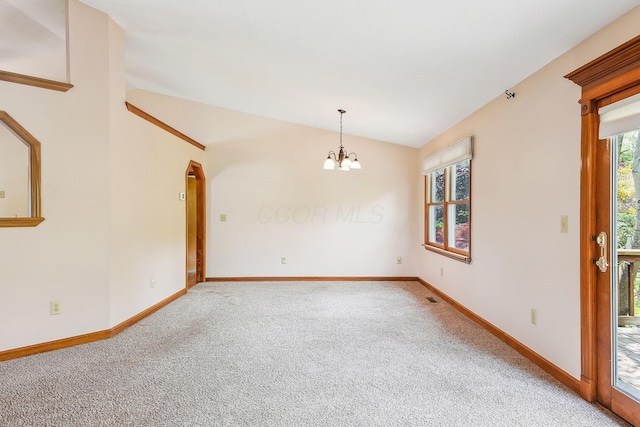 4217 Caswell Rd, Johnstown, OH 43031 - spare room featuring vaulted ceiling, light carpet, a chandelier, and baseboards
