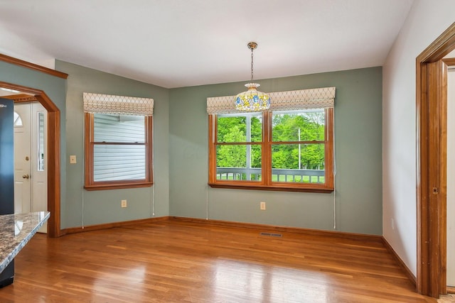 4217 Caswell Rd, Johnstown, OH 43031 - unfurnished dining area featuring wood finished floors and baseboards