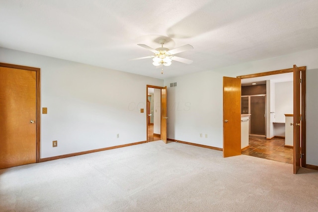 4217 Caswell Rd, Johnstown, OH 43031 - unfurnished bedroom with carpet floors, baseboards, and ceiling fan