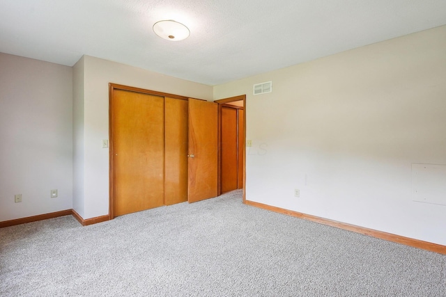 4217 Caswell Rd, Johnstown, OH 43031 - unfurnished bedroom featuring carpet floors, a closet, and baseboards
