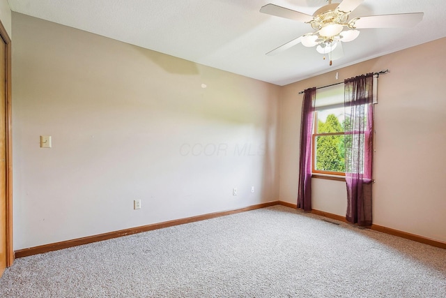 4217 Caswell Rd, Johnstown, OH 43031 - carpeted spare room featuring baseboards and a ceiling fan