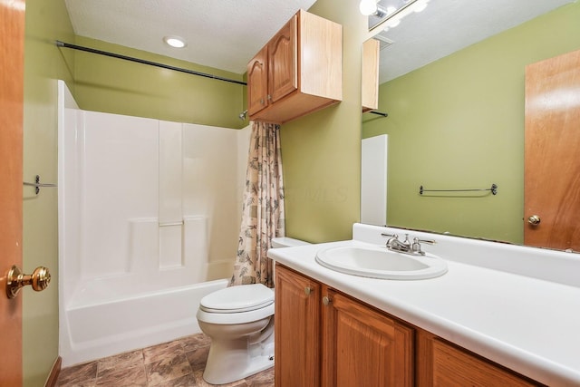 4217 Caswell Rd, Johnstown, OH 43031 - bathroom with toilet, shower / tub combo, vanity, and a textured ceiling