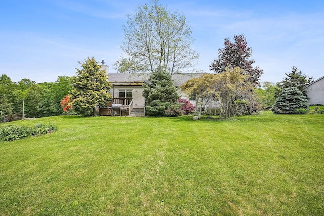 4217 Caswell Rd, Johnstown, OH 43031 - view of grassy yard with a wooden deck