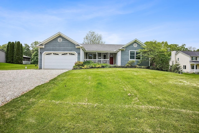 4217 Caswell Rd, Johnstown, OH 43031 - ranch-style home with covered porch, an attached garage, a front lawn, and gravel driveway