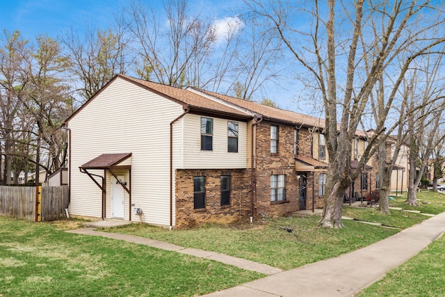 view of property exterior featuring brick siding