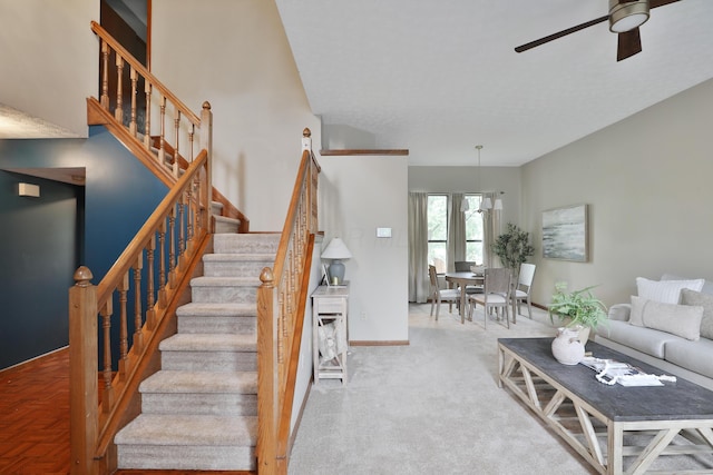 587 Center Woods Dr, Columbus, OH 43214 - stairway with a ceiling fan, baseboards, and carpet