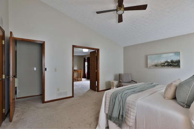 587 Center Woods Dr, Columbus, OH 43214 - bedroom with light colored carpet, lofted ceiling, baseboards, a textured ceiling, and a ceiling fan