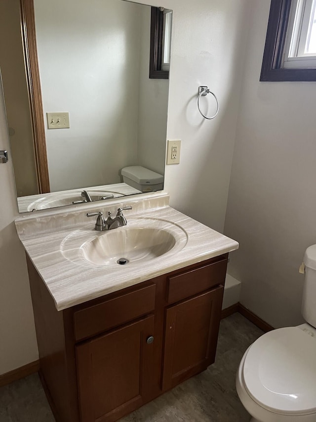 65 E N St, Newark, OH 43055 - half bath with toilet, vanity, and baseboards