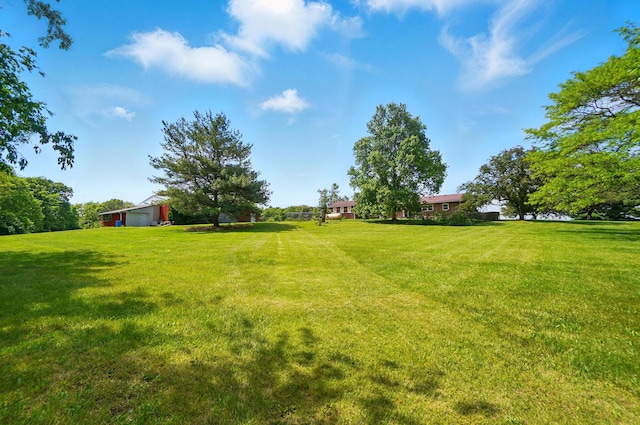3865 Anderson Rd, Circleville, OH 43113 - view of green lawn with an outdoor structure and an outbuilding