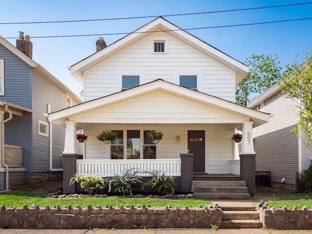697 Stanley Ave, Columbus, OH 43206 - traditional style home featuring a porch