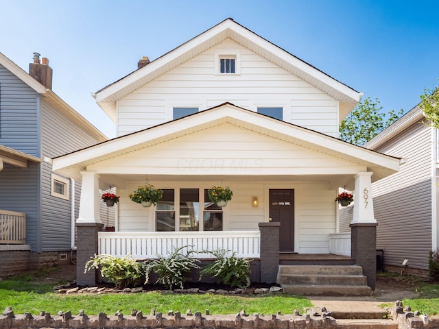 697 Stanley Ave, Columbus, OH 43206 - view of front of house featuring a porch