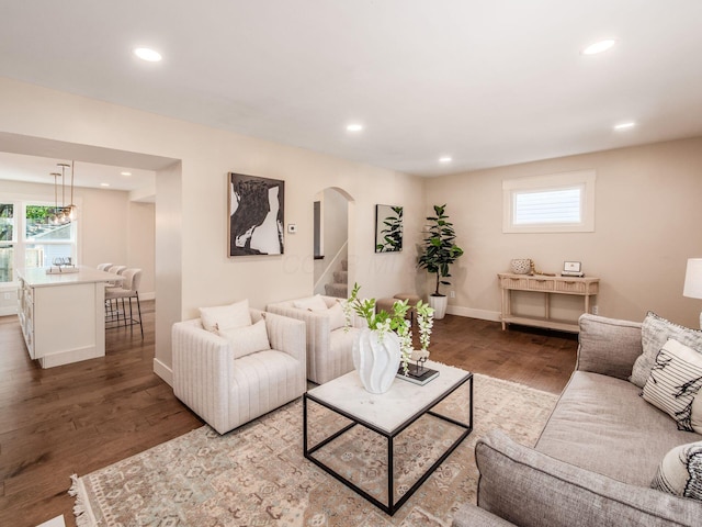 697 Stanley Ave, Columbus, OH 43206 - living area with plenty of natural light, wood finished floors, recessed lighting, baseboards, and arched walkways
