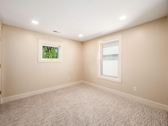 697 Stanley Ave, Columbus, OH 43206 - unfurnished room featuring baseboards, recessed lighting, and carpet floors