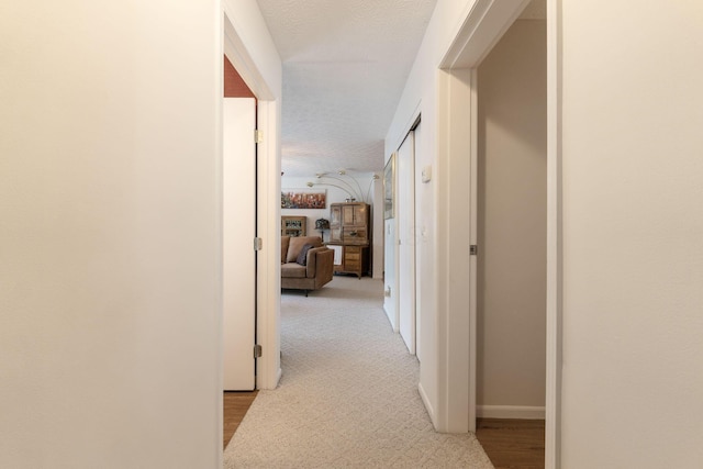 4642 Hobson Dr Unit 13E, Columbus, OH 43228 - hallway featuring baseboards